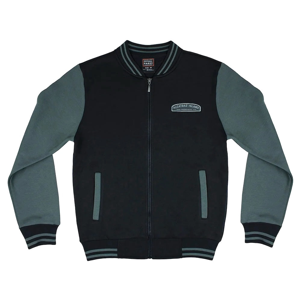 Black varsity style Alcatraz jacket with grey sleeves, by the Golden Gate National Parks Conservancy