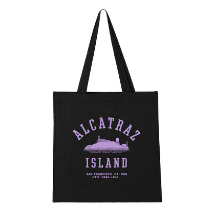 Black tote bag with purple Alcatraz Island design and screenprint, limited edition by the Golden Gate National Parks Conservancy.