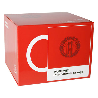 Package gift box for Pantone International Orange Golden Gate Bridge mug, depicting red mug with white handle on a red background. 