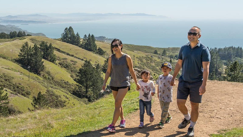 A family walks a trail at Mount Tamalpais.