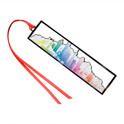 Rainbow colored San Francisco skyline cutout metal bookmark in packaging with blue and white design