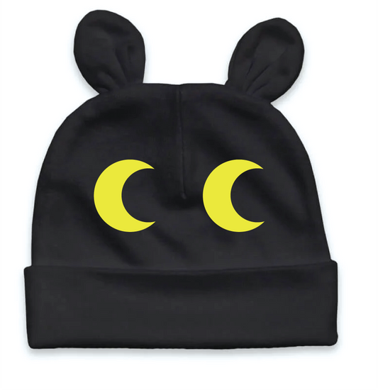 Parks After Dark baby cap with little animal ears, black with glow-in-the-dark yellow eyes.