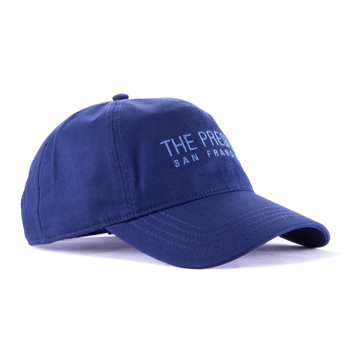 Blue baseball cap with blue The Presidio San Francisco words embroidered on front panels.