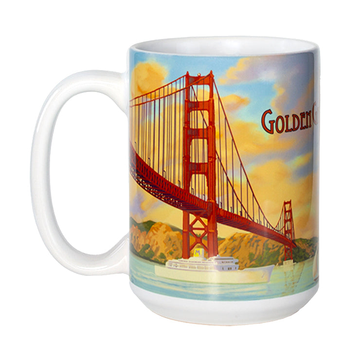 White ceramic 15-ounce mug featuring a colorful illustration of San Francisco's Golden Gate Bridge at sunset. The sky is lit with colorful orange clouds, while boats sail on the tranquil aqua blue waters of the bay.